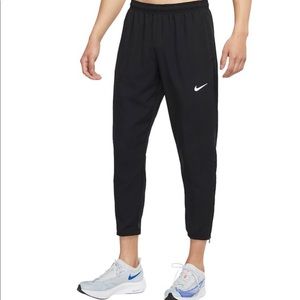 Nike Dri-FIT Challenger Woven Pant in Black